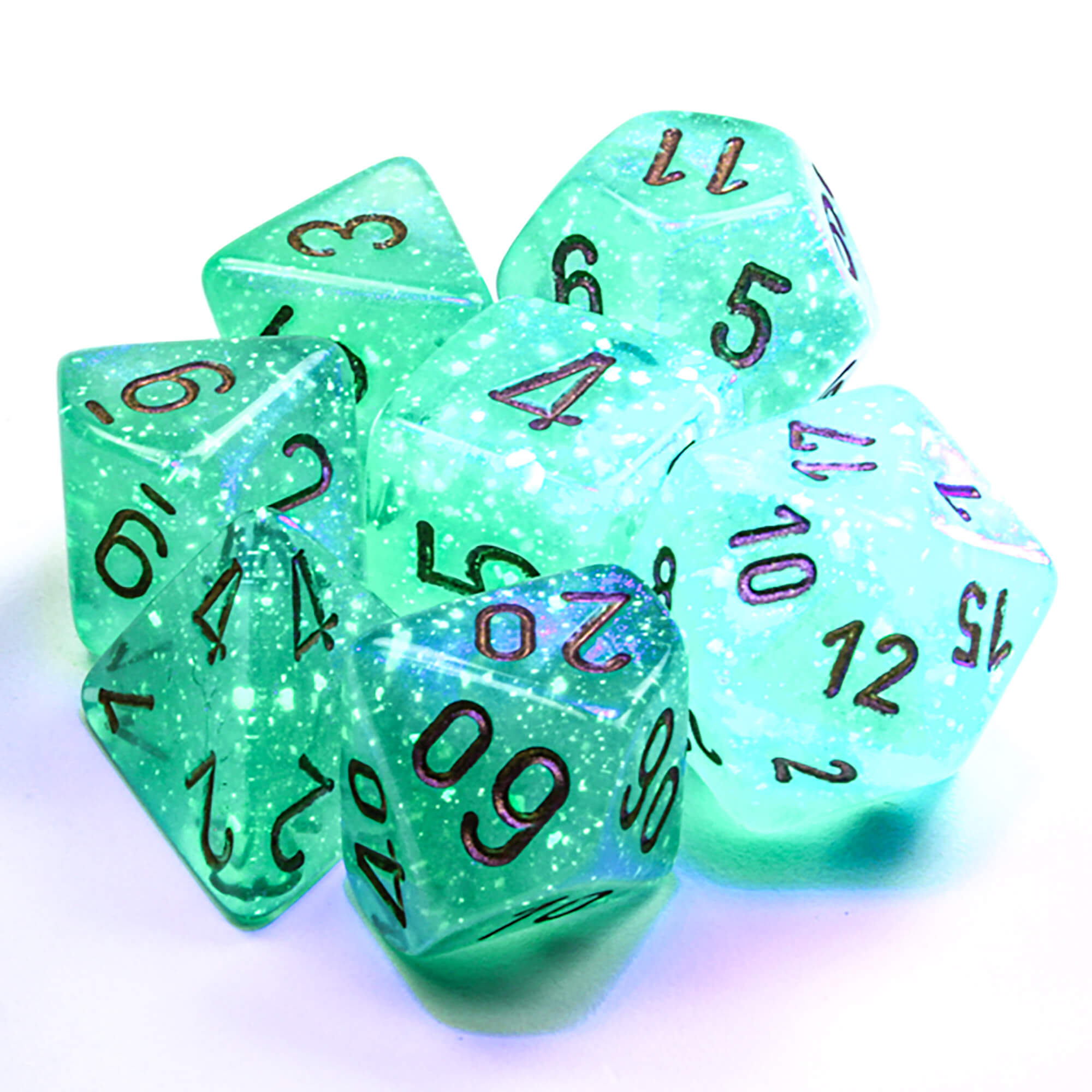Chessex Borealis Light Green Gold sada 7 kostek svítící